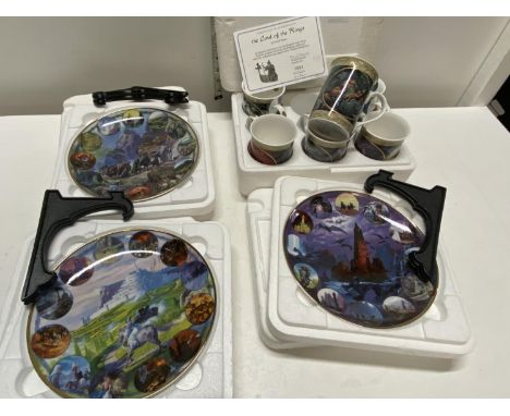 A selection of Danbury Mint Lord of the Rings collectors plates and cups 
