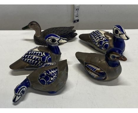 A selection of assorted duck figurines, mainly brass and enamel. 