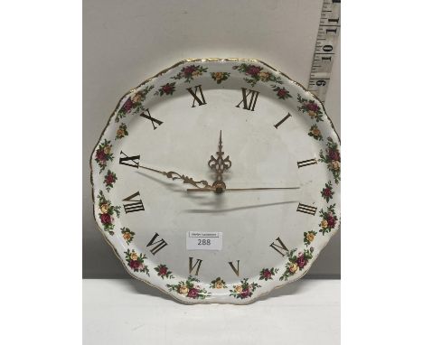 A Royal Albert Old Country Roses battery operated wall clock 