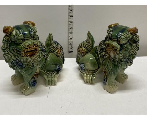 A pair of ceramic Chinese Fou Dogs h23cm 