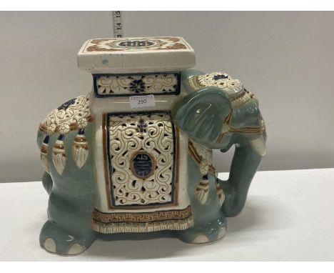 A ceramic elephant planter stand 
