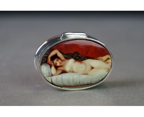 Silver pill box with enamel lid depicting a nude female figure 