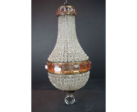An antique ceiling light with faceted decoration. 