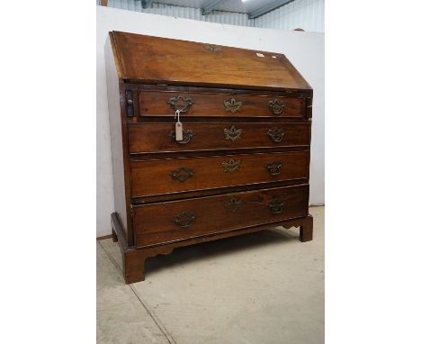 George III Mahogany Bureau, the fall front opening to a fitted interior over four long drawers raised on bracket feet, 92cm w