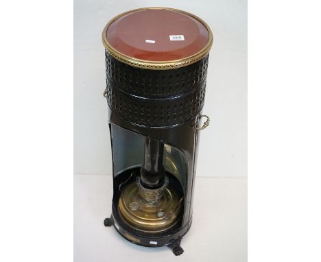 19th / Early 20th century ' Ardent ' Paraffin Floor Standing Metal and Brass Lamp with brown glass chimney, raised on three p