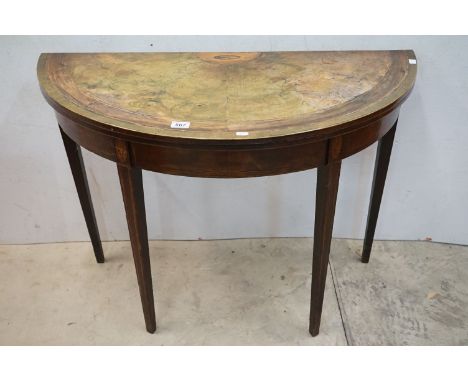 George III Mahogany Inlaid Demi Lune Card Table raised on square tapering legs, 107cm long x 70cm high 