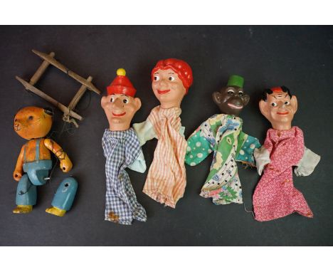Luntoy Diecast ' Sooty ' Articulated Puppet together with Four Mid century ' Mr Punch ' Hand Puppets with composite heads 