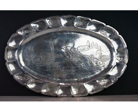 A Mexican .900 silver oval dish with engraved decoration of geese. 