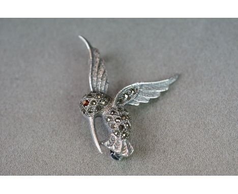 Silver hummingbird brooch with ruby eye 