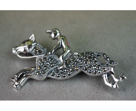 Silver and marcasite horse and rider brooch 