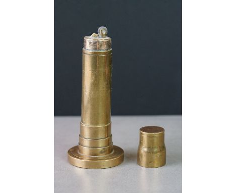 Brass table lighter in the form of a lighthouse with wren farthing decoration 