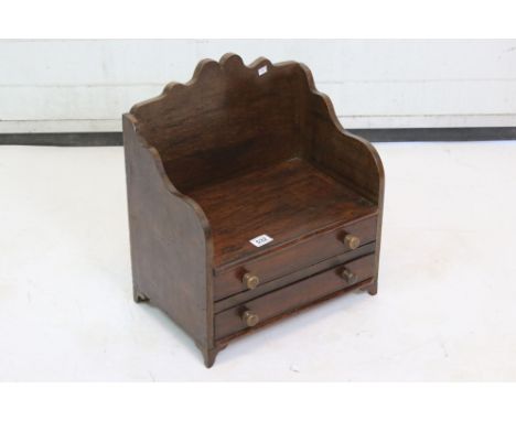Vintage oak book rack with two drawers 