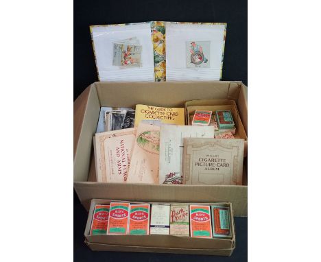 Box of cigarette cards, many contained in vintage cigarette packets, to include Gallaher, Wix, Players etc, together with a f