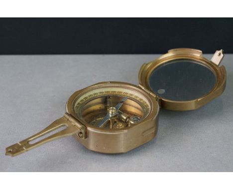 A brass cased compass marked Stanley London. 