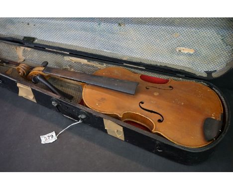A vintage violin, body measures approx 14.5" 