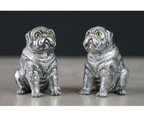 Pair of silver plated condiments in the form of pug dogs 