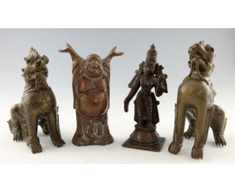Four cast bronze figures, two Far Eastern mythical beasts, Buddha figure and a figure in a headdress, all approximately 18cm 