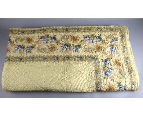 Early 20th century cream cotton hand stitched quilt with floral and paisley border in pastel shades and floral and foliate qu