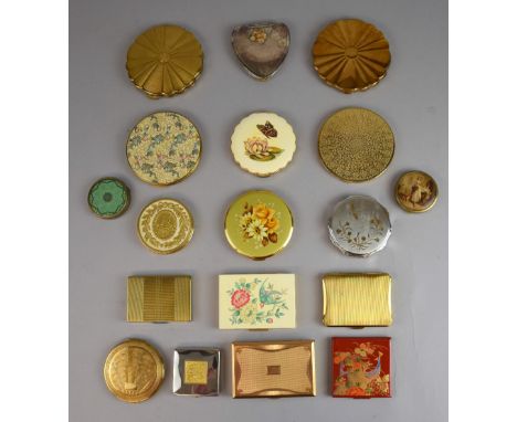 A collection of powder compacts in gilt metal and enamel finishes to include examples by Kigu, Vogue, Innoxa, Elizabeth Arden