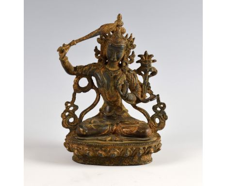 Sino-Tibetan gilt bronze figure of Manjusri seated in dhyanasana, the left hand in vitarka mudra, on a lotus throne and holdi