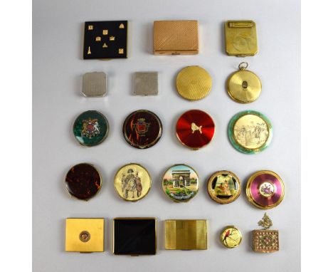 A collection of French and French themed compacts in gilt, white metal and enamel finishes, including items by Coty, Innoxa, 
