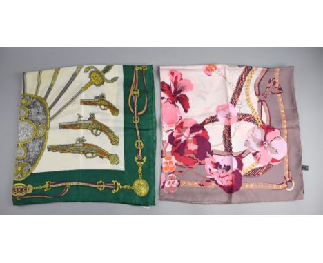 A vintage Gucci silk scarf with military emblems and emerald green border and another with pink floral design .    Green scar