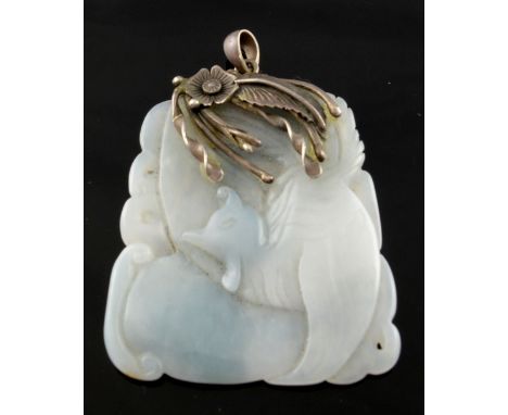 Chinese white and pale blue mottled jade pendant carved as a phoenix in a silver foliate mount, marked '925', 5.5cm high,  . 