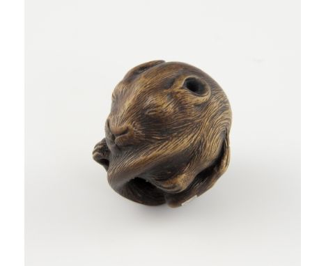 Japanese wood netsuke carved as a rat curled up in a ball, inset white metal signature cartouche with signature, 3.5cm diamet
