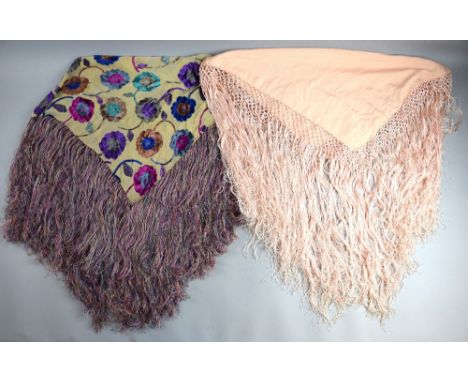 A 1920's devore fringed shawl in deep colours on a cream background , together with a plain peach silk fringed shawl.    Devo