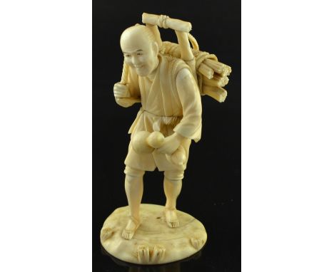 19th century Japanese ivory okimono of a man carrying a bundle of wood on his back, gourds in his left hand, signed on a red 