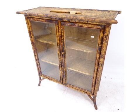 An early 20th century bamboo-framed 3-shelf bookcase/display cabinet, with 2 glazed doors, W90cm, H103cm, D35cm1 section of b