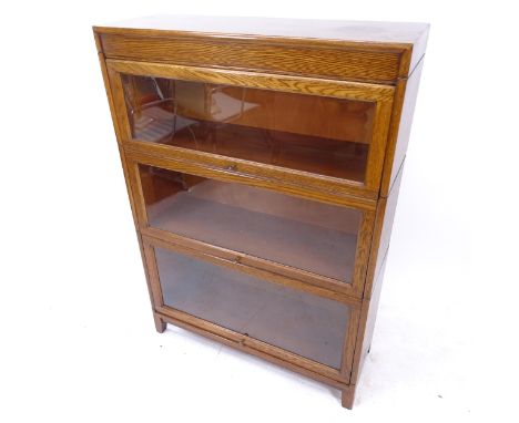 An early 20th century oak Globe Wernicke style 3-shelf stacking bookcase, W87cm, H122cm, D31cm 