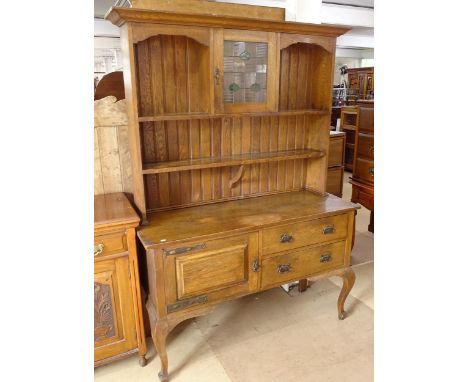 An early 20th century oak Arts and Crafts 2-section dresser, with single lead-light glazed cupboard door, and 2 fitted drawer