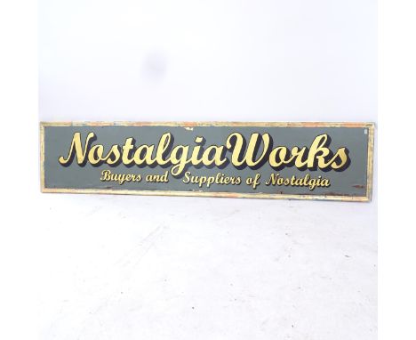 A Vintage painted shop sign, for Nostalgia Works, Buyers and Suppliers of Nostalgia, L203cm, H45cm 