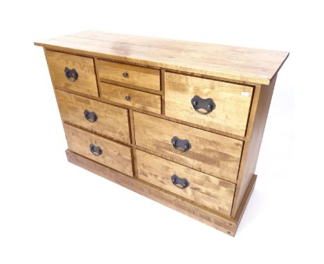 A contemporary light oak chest of 8 drawers, W127cm, H85cm, D43cm 