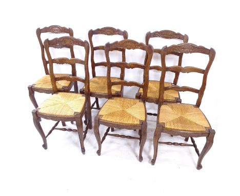 A set of 6 French oak ladder-back dining chairs 