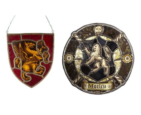 Two stained glass panelsthe first with central griffin design in armorial shield, 26.5cm x 21.5cm approx overall, the other w