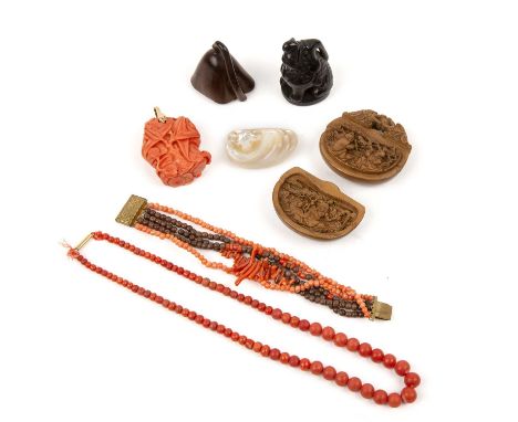 Group of piecesChinese and Japanese, including a carved coral pendant, a mother of pearl netsuke, two wood netsukes, a carved