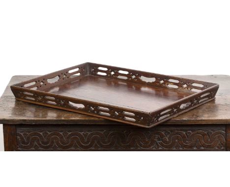 George III mahogany Chippendale-style traywith pierced decoration and handles, with a burgundy felt lining to the underneath,