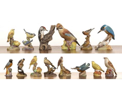 Collection of twelve Royal Worcester bird figure groups all in matt glaze, including a large model of a jay, yellowhammers, b