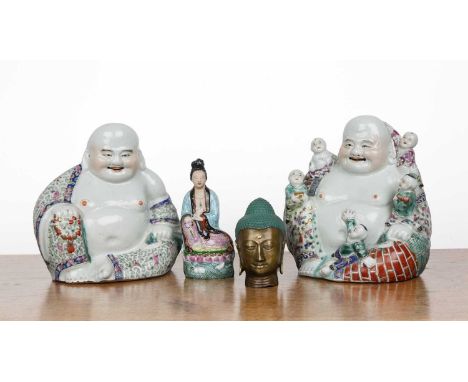 Two polychrome porcelain seated BuddhasChinese, 20cm and 19cm, a model of a seated Guanyin, 15.5cm and a brass and painted Th