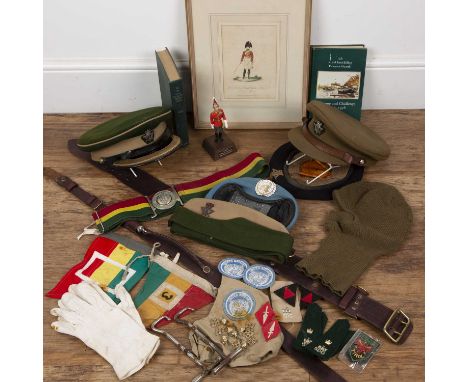 Collection of militaria to include: items related to the 5th Royal Inniskilling Dragoon Guards, such as books, cap badges, en