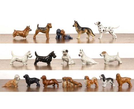 Collection of 17 Royal Worcester dogsto include: Spaniels, Bull terriers, Dalmatians, Alsatians, Airedale terrier, Daschunds 