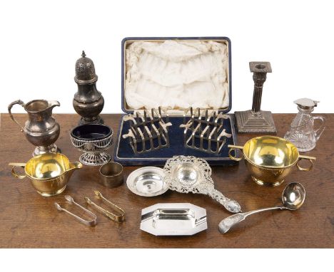 Collection of miscellaneous silver to include: a cased set of four Mappin & Webb silver toast racks, a silver jug, with decor