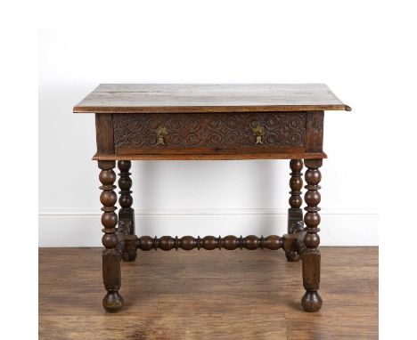 Oak side table18th Century, having a carved drawer on bobbin supports and stretchers, 93cm x 65.5cm x 75.5cm  Missing a side 
