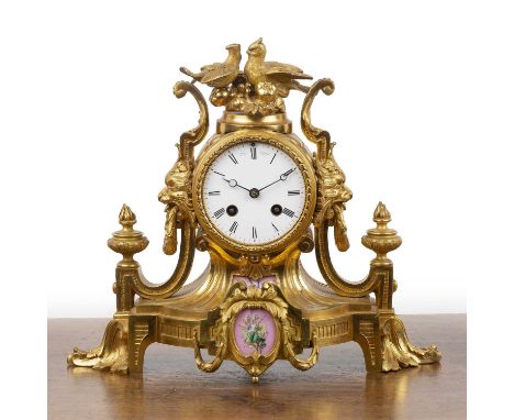 French ormolu and porcelain mounted eight-day mantel clock the white enamel dial with Roman numerals marked 'Charles Frodsham