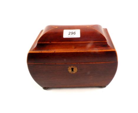 A Georgian inlaid mahogany two compartment tea caddy with lion mask ring handles