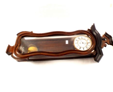 A regulator wall clock in grained waisted case