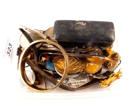 A silver gilt bangle plus coins and badges etc