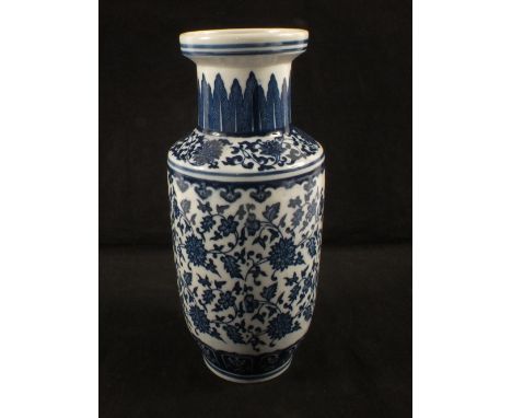 A Chinese blue and white vase with floral decoration, seal mark, height 9"